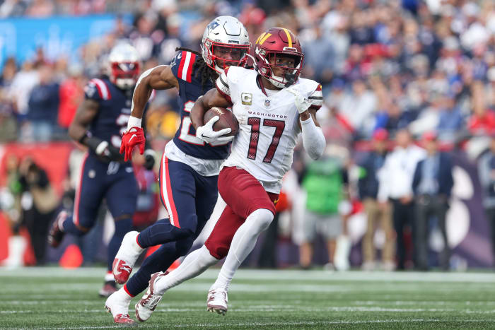 Washington Commanders receiver Terry McLaurin (17) runs the ball during the second half against the New England Patriots at Gillette Stadium.